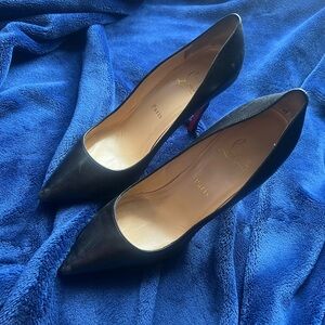 Used red Christian Louboutin size 39.